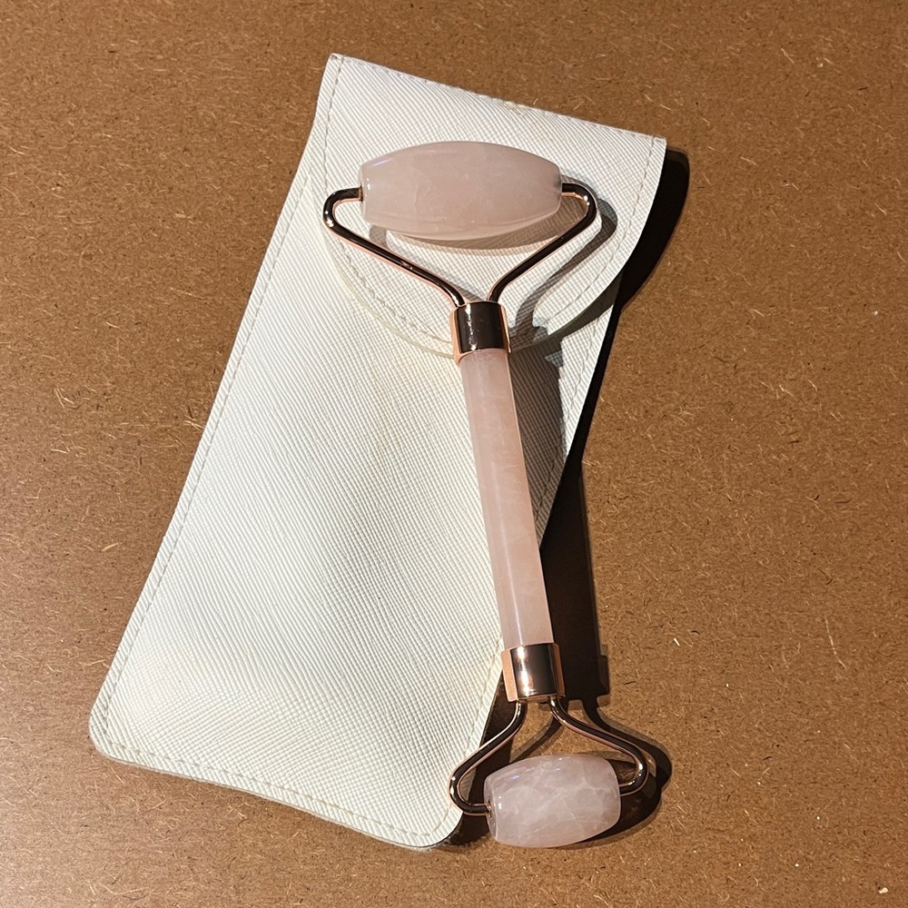 Elegant Pink Quartz Facial Roller with White Pouch